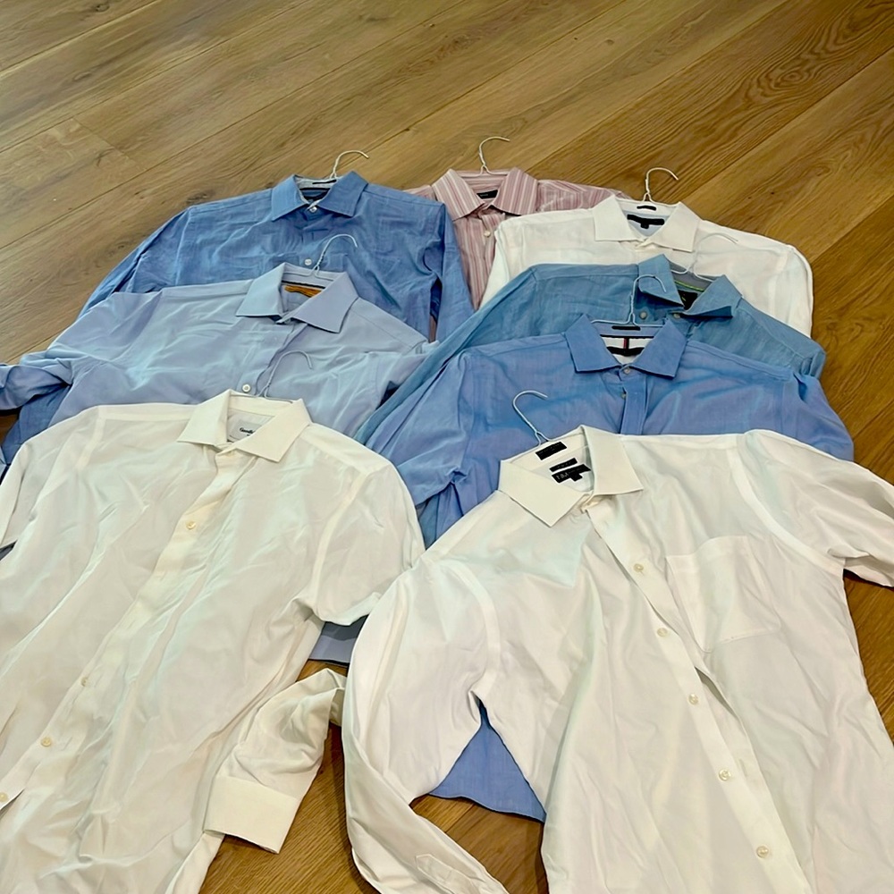 7 Mens shirts most large. All dry cleaned